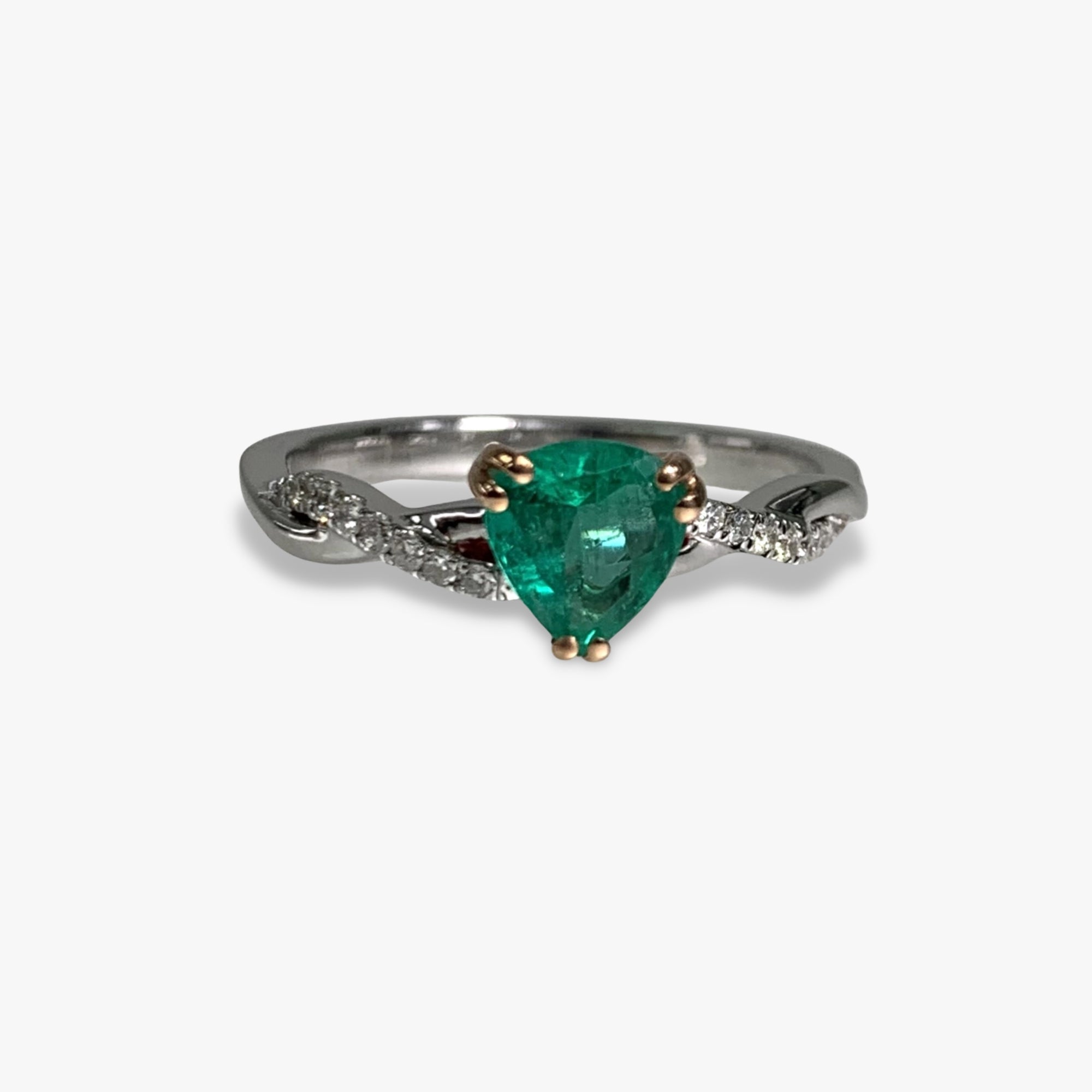 Trillion cut hot sale emerald ring