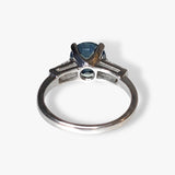 14k White Gold Round Blue Sapphire and Tapered Baguette Diamond Three-Stone Ring Back View