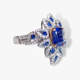 18k White Gold Emerald Cut Blue Sapphire and Diamond Floral Ring Side View