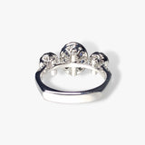 18k White Gold Oval Blue Sapphire and Diamond Three-Stone Halo Ring Back View