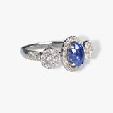 18k White Gold Oval Blue Sapphire and Diamond Three-Stone Halo Ring Side View