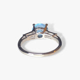 Platinum Round Aquamarine and Tapered Baguette Diamond Three-Stone Ring Back View